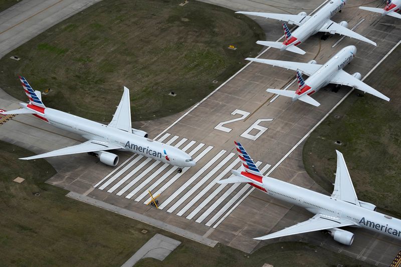 &copy; Reuters. American Airlines passenger planes crowd a runway in Tulsa