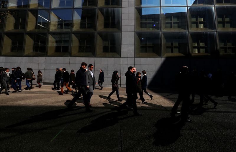 &copy; Reuters. People walk on the esplanade of La Defense in the financial and business district of La Defense, west of Paris