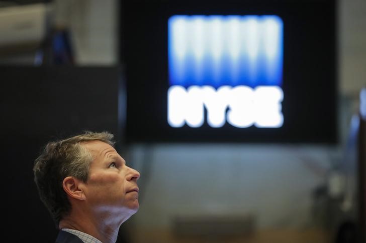 &copy; Reuters. Traders work on the floor of the NYSE in New York