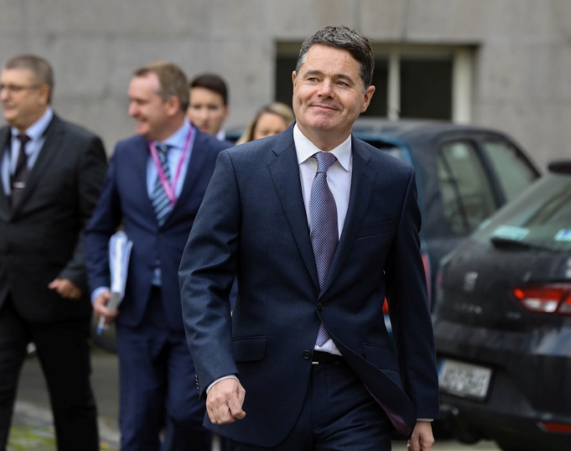 &copy; Reuters. FILE PHOTO: Irish Finance Minister Paschal Donohoe walks outside Government Buildings in Dublin