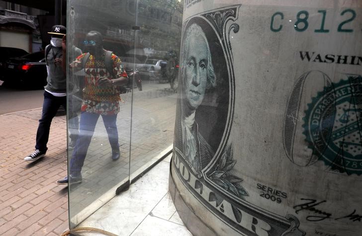 &copy; Reuters. Man wears protective mask in Egyptian capital Cairo