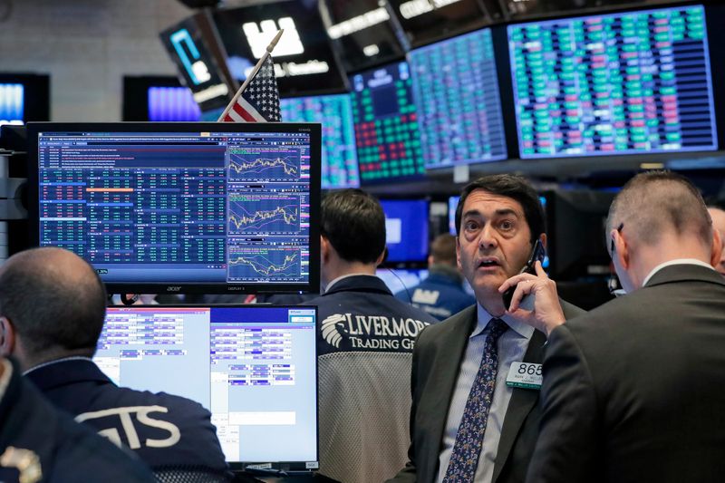 &copy; Reuters. Traders work on the floor of the NYSE in New York