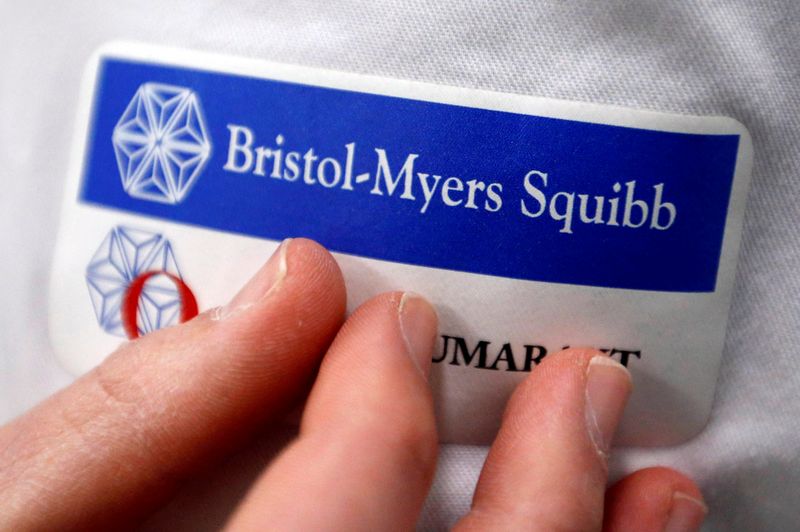 &copy; Reuters. FILE PHOTO: Logo of global biopharmaceutical company Bristol-Myers Squibb is pictured on the blouse of an employee in Le Passage