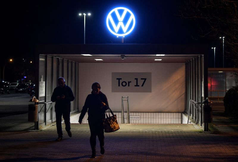 &copy; Reuters. Employees leave the Volkswagen plant after VW starts shutting down production in Europe amid the outbreak of coronavirus disease (COVID-19) in Wolfsburg
