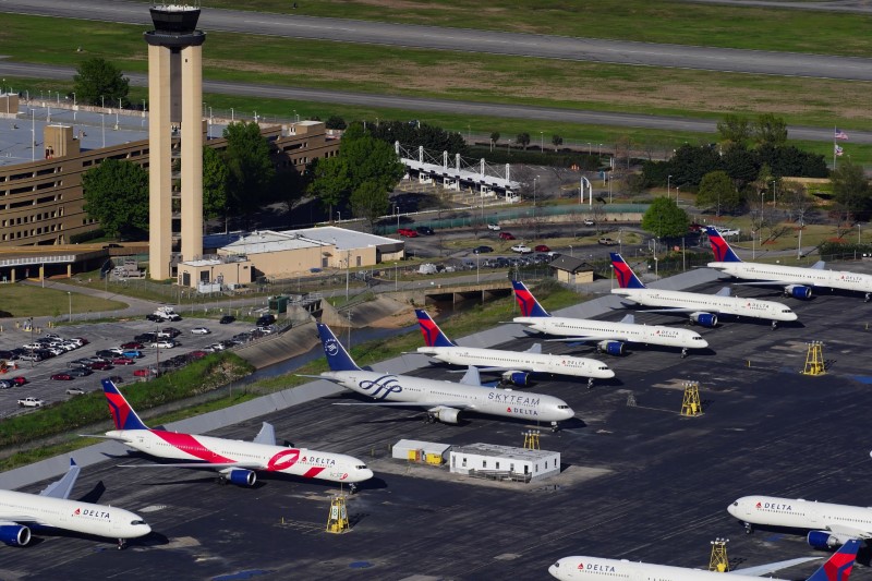 &copy; Reuters. Delta Air Lines passenger planes parked in Birmingham