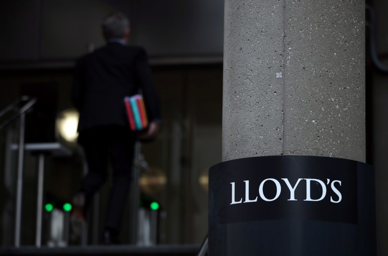 &copy; Reuters. Man enters the Lloyd&apos;s of London building in the City of London financial district