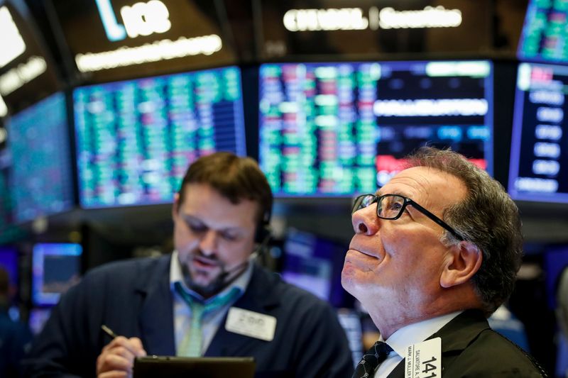 &copy; Reuters. Traders work on the floor of the NYSE in New York