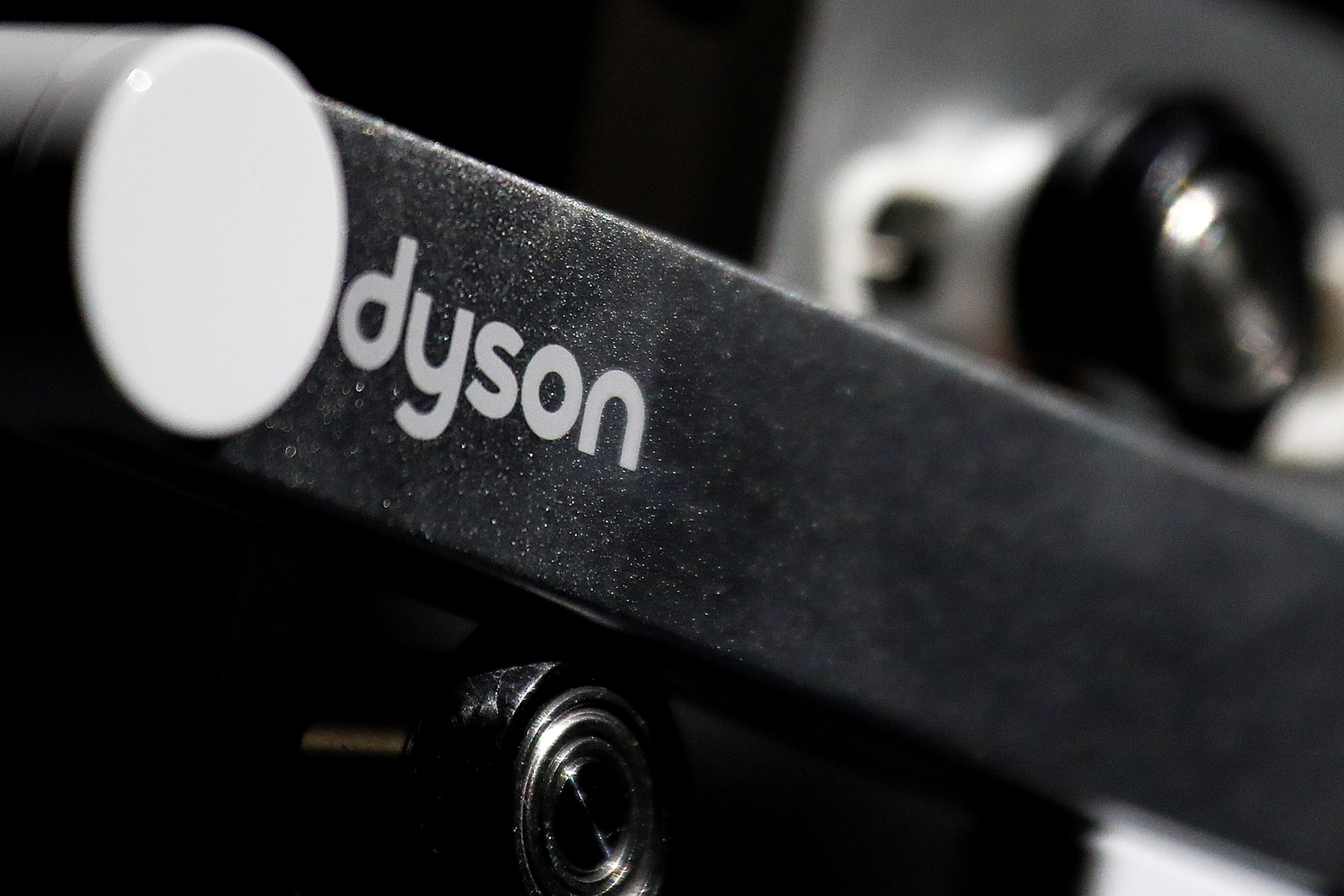 © Reuters. FILE PHOTO: Dyson logo is seen on one of company's products presented during an event in Beijing