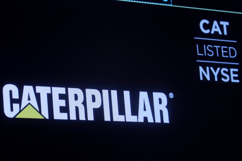 &copy; Reuters. The company logo for Caterpillar Inc. is displayed on a screen at the NYSE in New York