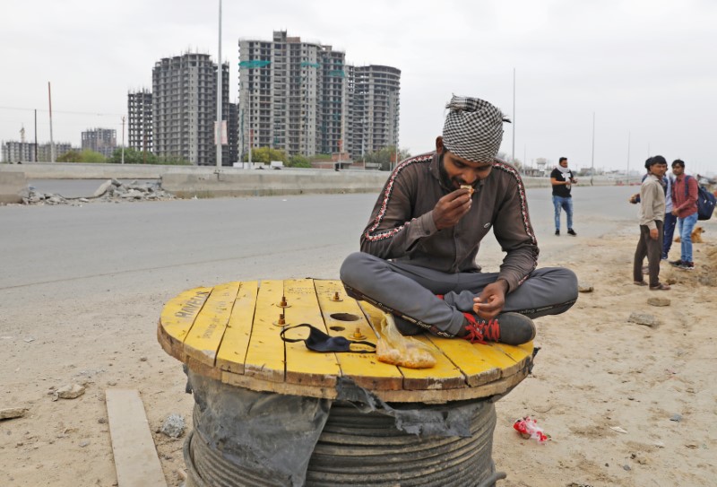 India's migrant workers face long walk home amid coronavirus lockdown ...