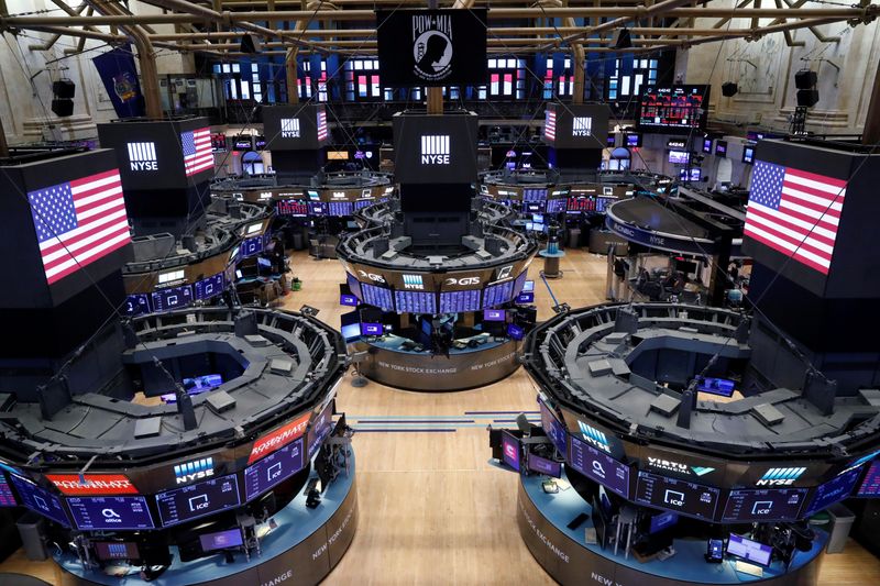 &copy; Reuters. The floor of the New York Stock Exchange (NYSE) stands empty as the building prepares to close indefinitely due to the coronavirus disease (COVID-19) outbreak in New York