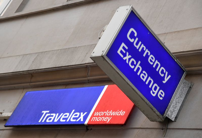 &copy; Reuters. FILE PHOTO: Signage is seen on a branch of Travelex Currency Exchange in London