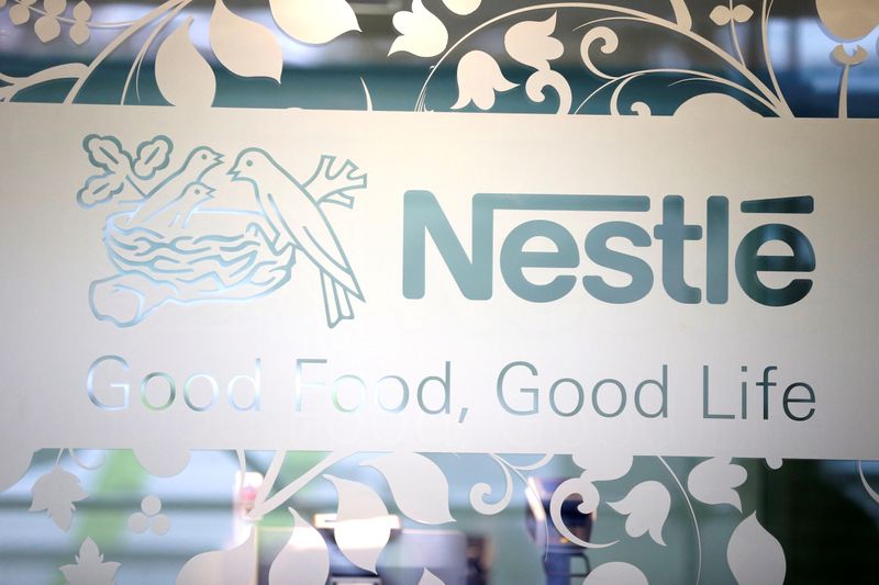 &copy; Reuters. FILE PHOTO: Nestle logo is pictured on the door of the supermarket of Nestle headquarters in Vevey