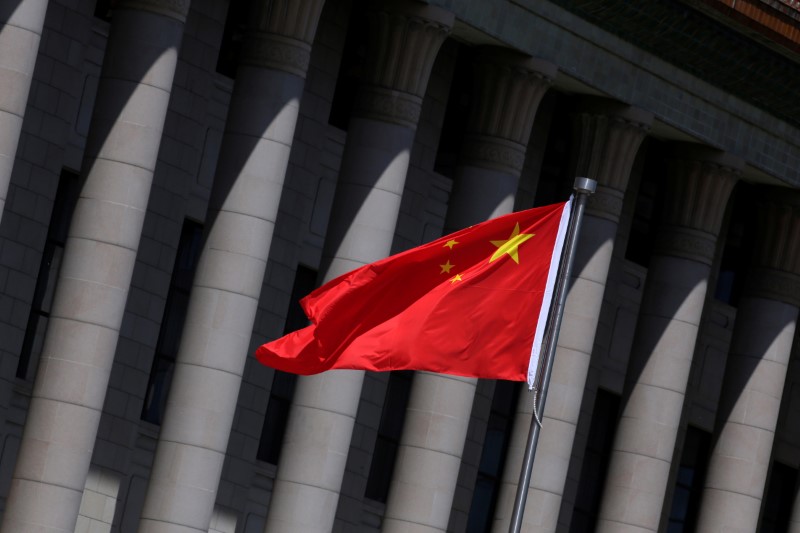 &copy; Reuters. Chinese flag flutters in front of the Great Hall of the People in Beijing