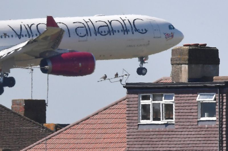 &copy; Reuters. A Virgin Atlantic Airbus comes in to land at Heathrow aiport in London