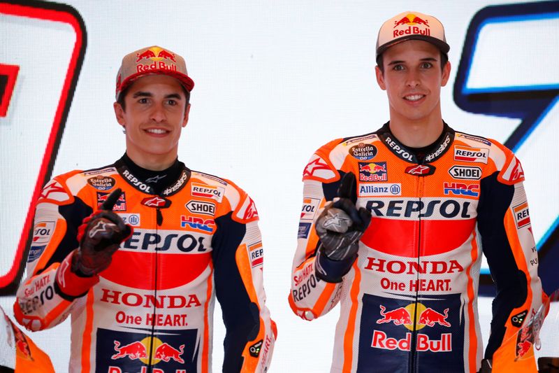 &copy; Reuters. Repsol Honda&apos;s Marc Marquez and Alex Marquez pose for pictures during a launching ceremony in Jakarta