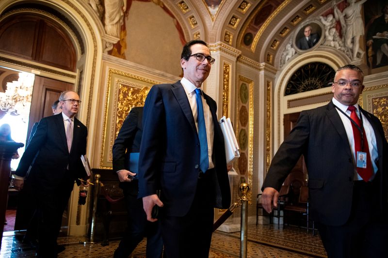 &copy; Reuters. FILE PHOTO: U.S. Secretary of the Treasury Steven Mnuchin walks to a meeting during negotiations on a coronavirus disease (COVID-19) relief package