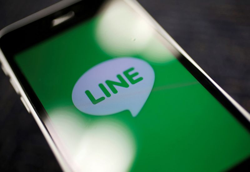 &copy; Reuters. The logo of free messaging app Line is pictured on a smartphone in this photo illustration taken in Tokyo, Japan