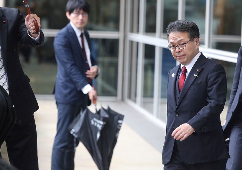 &copy; Reuters. Japan&apos;s Minister of Economy, Trade and Industry Hiroshige Seko leaves the European Commission headquarters after a meeting on steel overcapacity, in Brussels