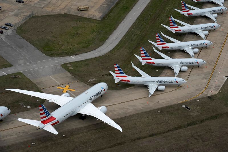 &copy; Reuters. FILE PHOTO: American Airlines passenger planes crowd a runway where they are parked due to flight reductions to slow the spread of coronavirus disease (COVID-19), at Tulsa International Airport in Tulsa
