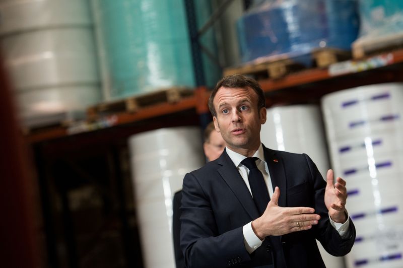 &copy; Reuters. Macron visits masks factory in France