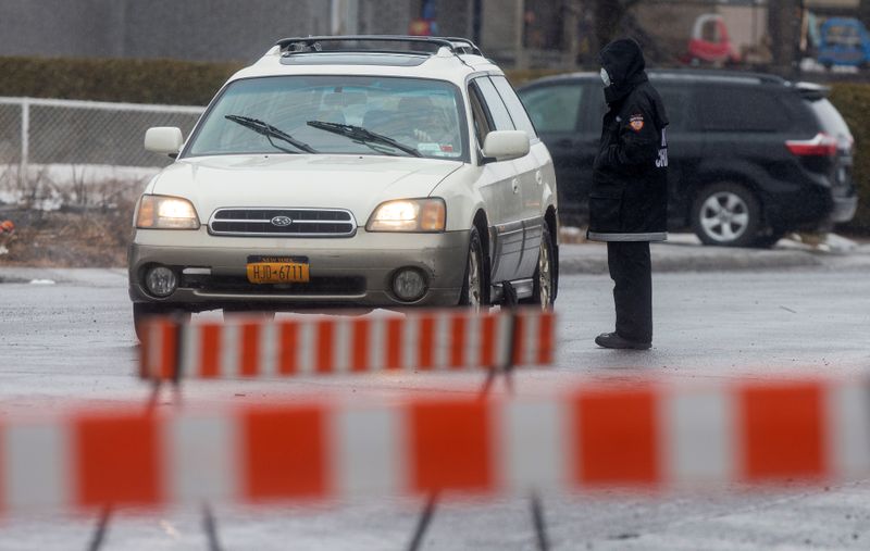 &copy; Reuters. Police and private security maintain quarantine orders in the Hasidic Jewish Tosh community of Boisbriand