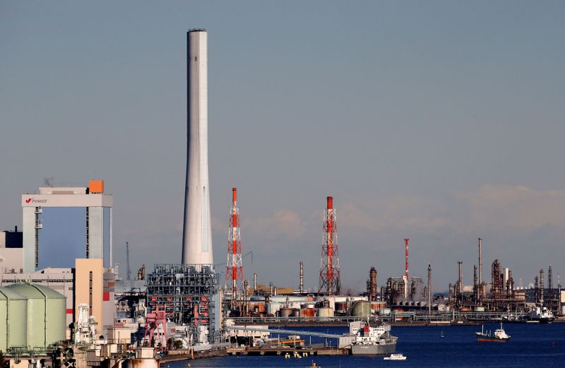 &copy; Reuters. Chimneys are seen at an industrial area in Yokohama