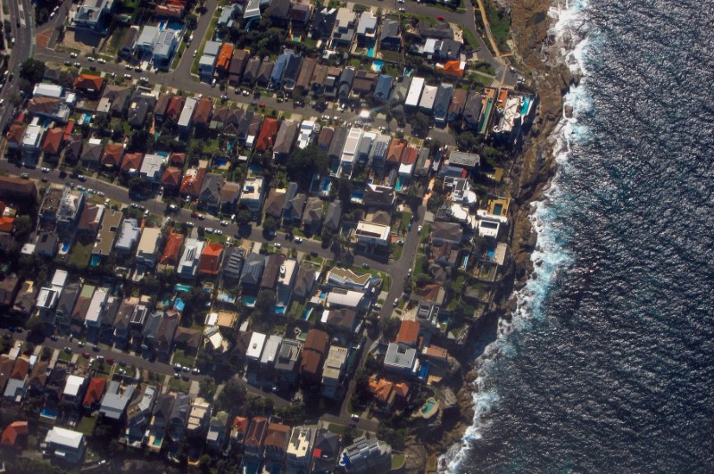 &copy; Reuters. Houses located in the Sydney suburb of Coogee can be seen along the coastline in Australia