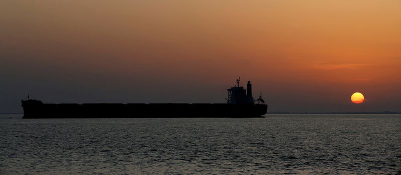 &copy; Reuters. FILE PHOTO: An oil tanker sits anchored off the Fos-Lavera oil hub near Marseille