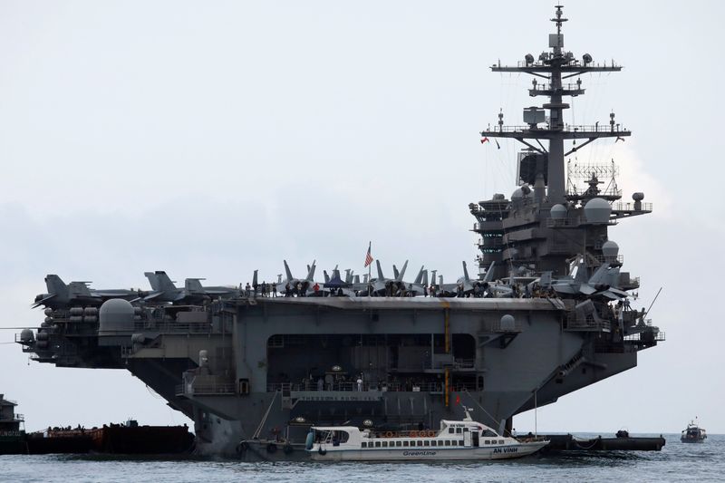 &copy; Reuters. FILE PHOTO: The USS Theodore Roosevelt (CVN-71) is seen while entering into the port in Da Nang, Vietnam