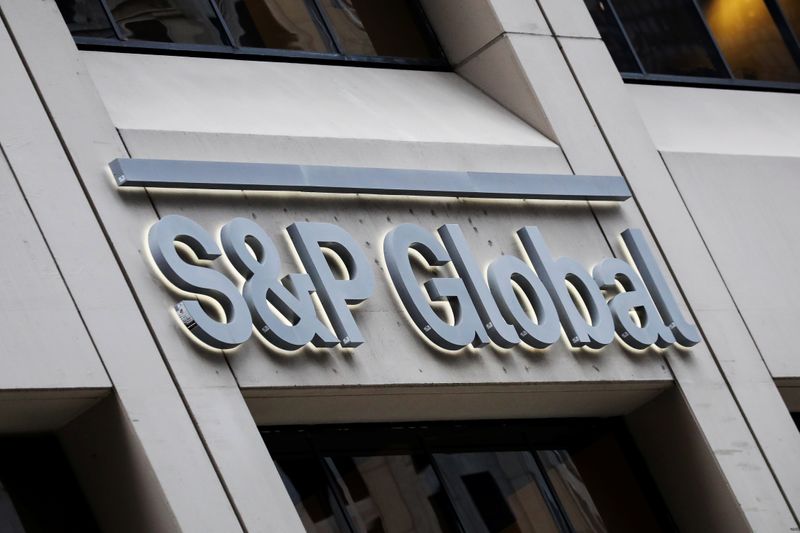 &copy; Reuters. The S&amp;P Global logo is displayed on its offices in the financial district in New York