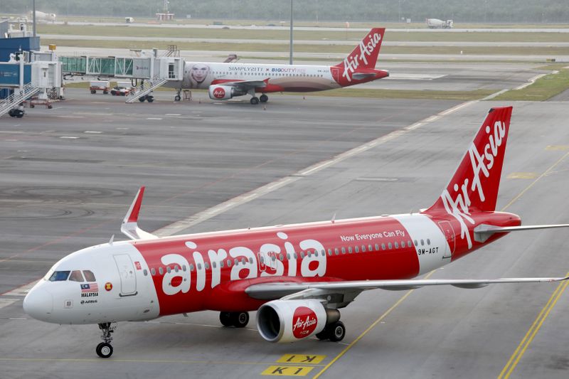 &copy; Reuters. AirAsia planes are seen on the tarmac of Kuala Lumpur International Airport 2 (KLIA2) in Sepang