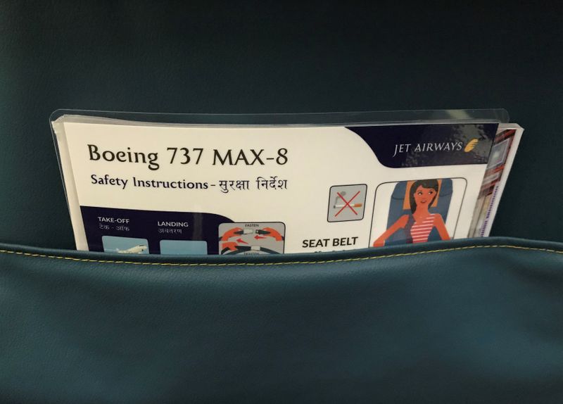 &copy; Reuters. FILE PHOTO:  A passenger safety instruction card of Jet Airways Boeing 737 MAX 8 plane is pictured during its induction ceremony at the Chhatrapati Shivaji International airport in Mumbai