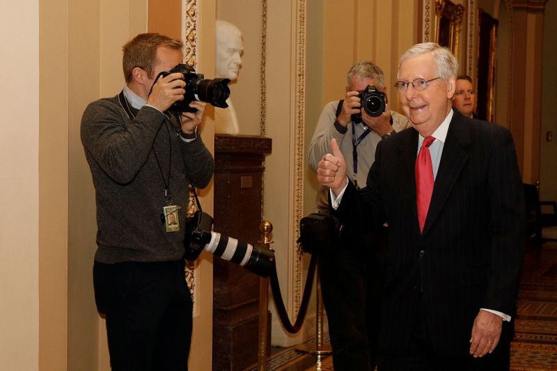 &copy; Reuters. U.S. Senate Majority Leader McConnell enters the Senate Chamber Floor after Congress agreed to a multi-trillion dollar economic stimulus package created in response to the economic fallout from the COVID-19 Coronavirus, on Capitol Hill in Washington