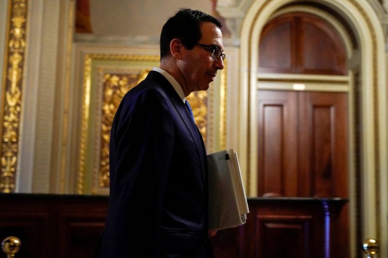 &copy; Reuters. FILE PHOTO: FILE PHOTO-U.S. Secretary of the Treasury Mnuchin walks to the meeting for a coronavirus relief package in Washington