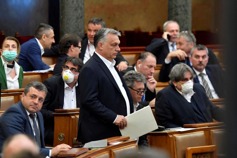 &copy; Reuters. FILE PHOTO: Hungarian Prime Minister Viktor Orban arrives to attend the plenary session of the Parliament ahead of a vote to grant the government special powers to combat the coronavirus disease (COVID-19) crisis in Budapest