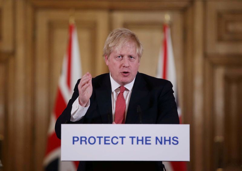 &copy; Reuters. FILE PHOTO: British PM Johnson gives daily address to nation on coronavirus in London