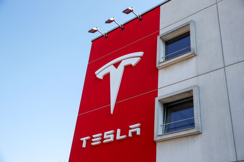 &copy; Reuters. Logo of Tesla is seen at a branch office in Bern
