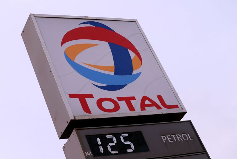 &copy; Reuters. Petrol price is displayed on a board below the Total logo in Abuja