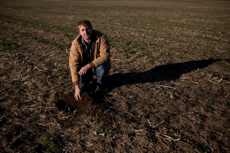 &copy; Reuters. Watermelon and asparagus farmer Mike Chromczak poses at Chromczak Farms in Brownsville