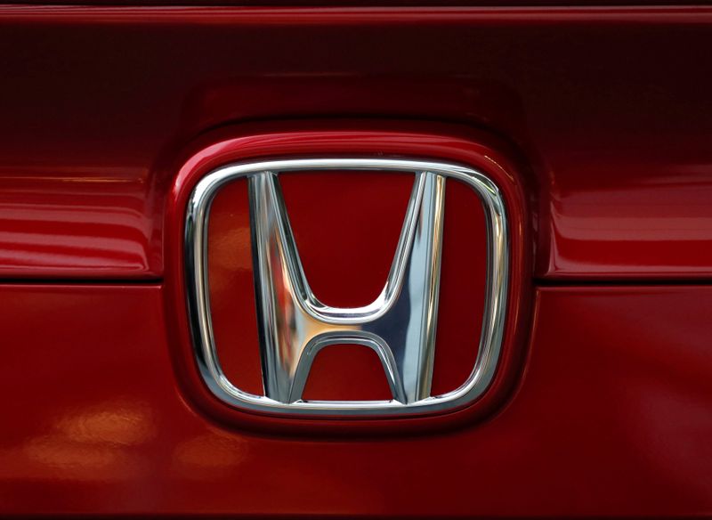 &copy; Reuters. Honda Motor&apos;s logo is seen on Civic sedan car at its showroom in Tokyo