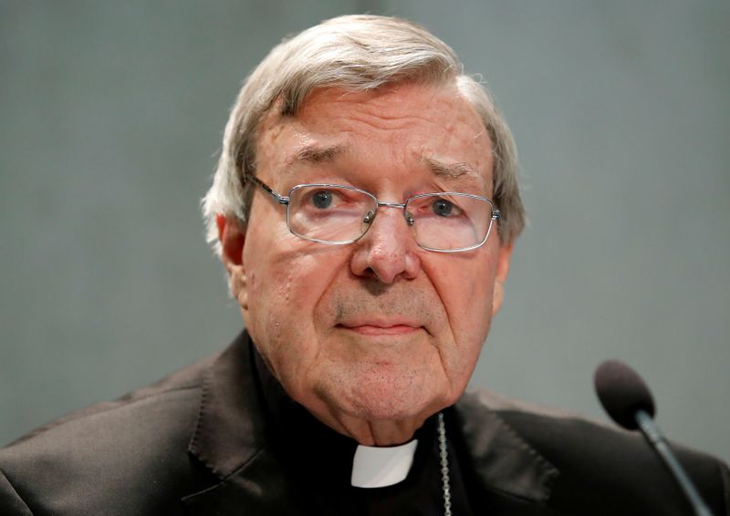 &copy; Reuters. FILE PHOTO: Cardinal George Pell attends a news conference at the Vatican