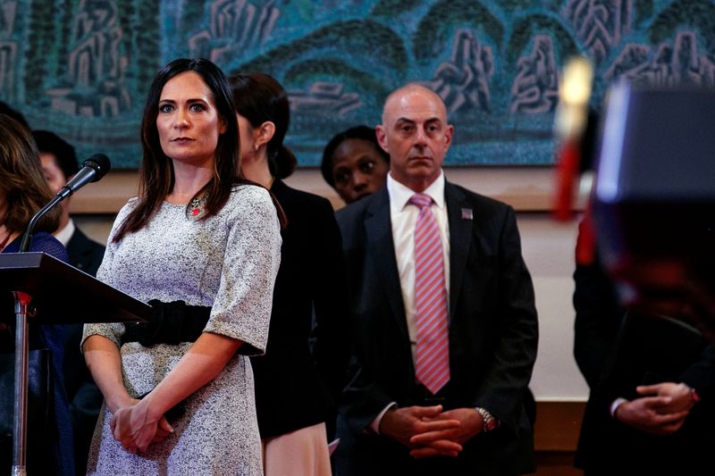 © Reuters. FILE PHOTO: White House press secretary Stephanie Grisham, left, attends a news conference by  President Donald Trump and South Korean President Moon Jae-in, at Blue House, in Seoul