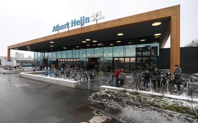 &copy; Reuters. FILE PHOTO: A logo of Albert Heijn is seen at the entrance of the shop operated by Ahold Delhaize, the Dutch-Belgian supermarket operator