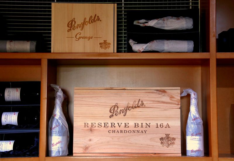 &copy; Reuters. FILE PHOTO: Bottles of Penfolds Grange wine and other varieties, made by Australian wine maker Penfolds and owned by Australia&apos;s Treasury Wine Estates, sit on shelves for sale at a winery located in the Hunter Valley, north of Sydney