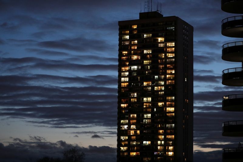 &copy; Reuters. Lights shine from apartments in a residential building during the global outbreak of coronavirus disease in Toronto