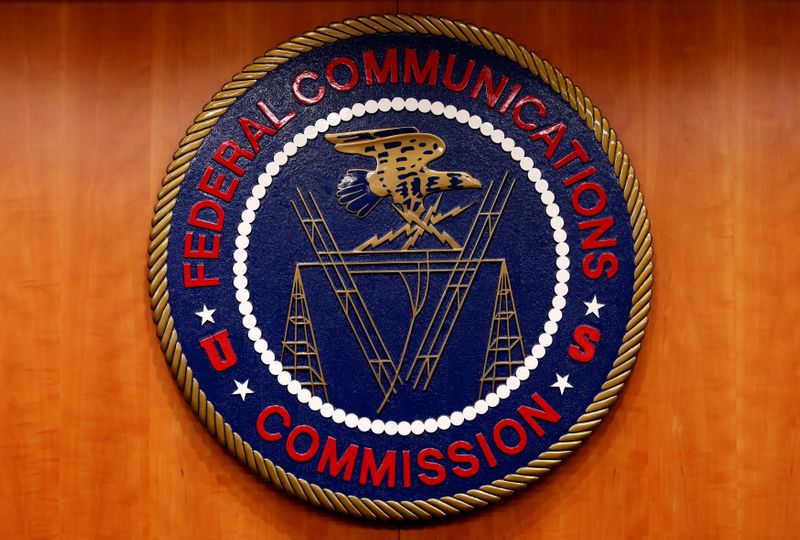 © Reuters. The Federal Communications Commission (FCC) logo is seen before the FCC Net Neutrality hearing in Washington