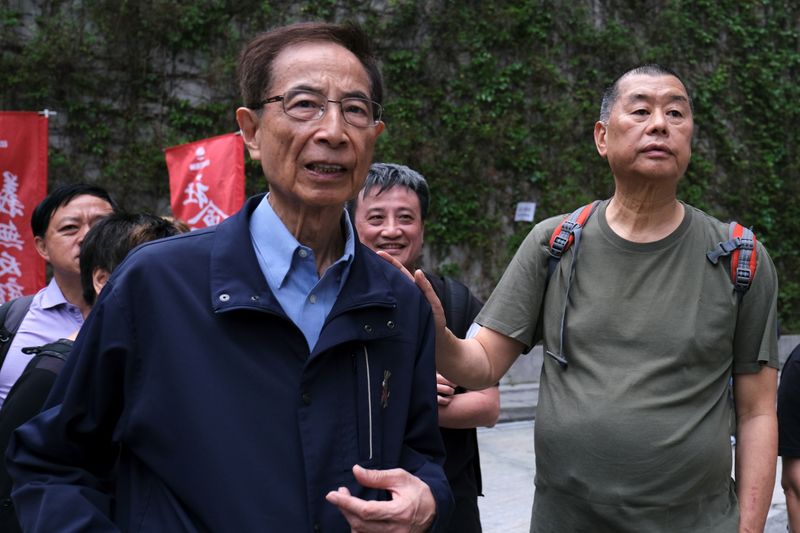 &copy; Reuters. FILE PHOTO:  Hong Kong politician Martin Lee and Founder of Next Media Jimmy Lai march during a protest to demand authorities scrap a proposed extradition bill with China, in Hong Kong