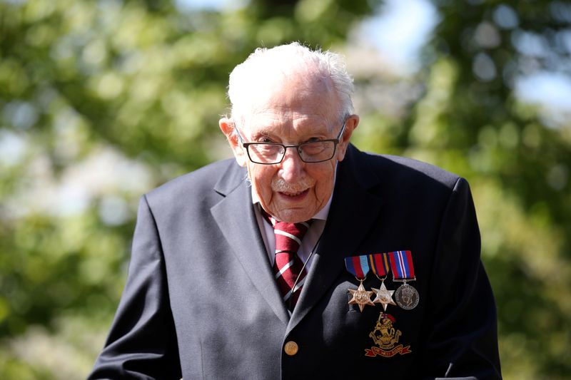 &copy; Reuters. FILE PHOTO: Retired British Army Captain Moore walks to raise money for health workers