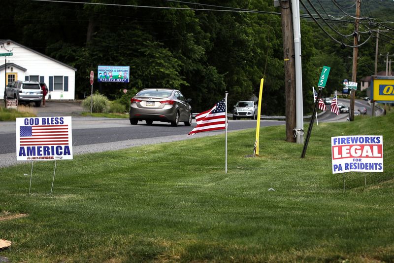 &copy; Reuters. Signs line a street in East Stroudsburg, where most homeowners are underwater one their mortgages, East Stroudsburg